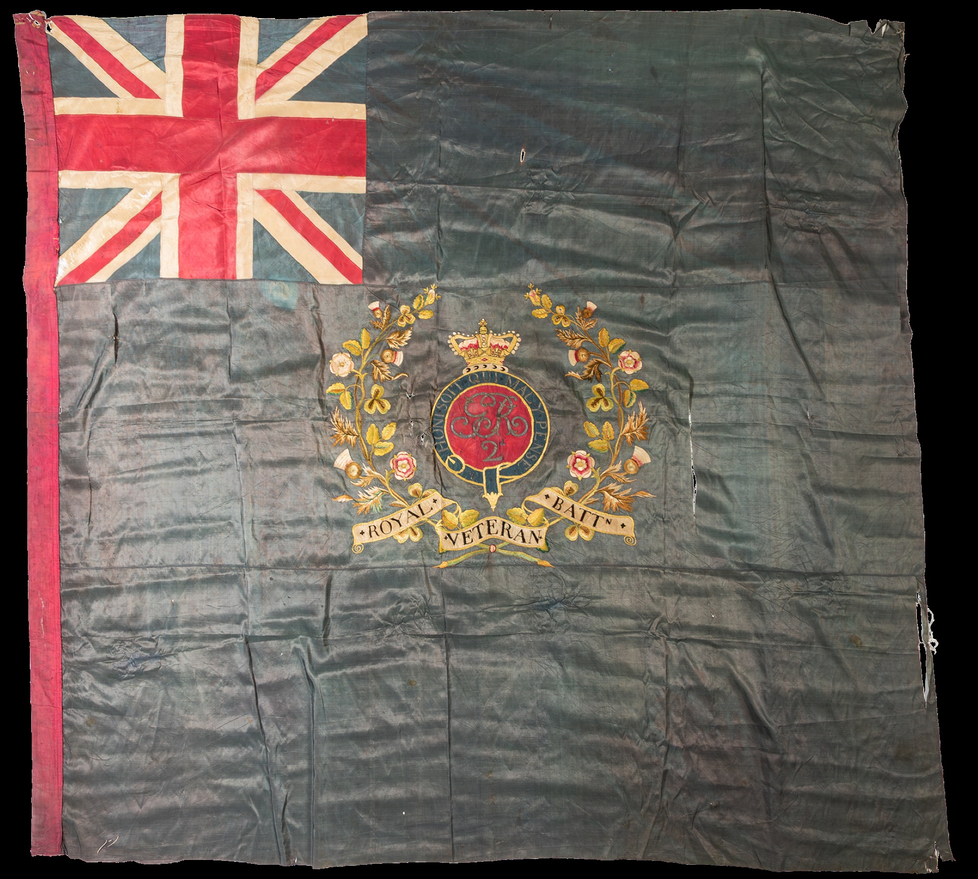 The hand-embroidered silk flag for the 2nd Royal Veterans Battalion dates back to the time of the Napoleonic Wars.