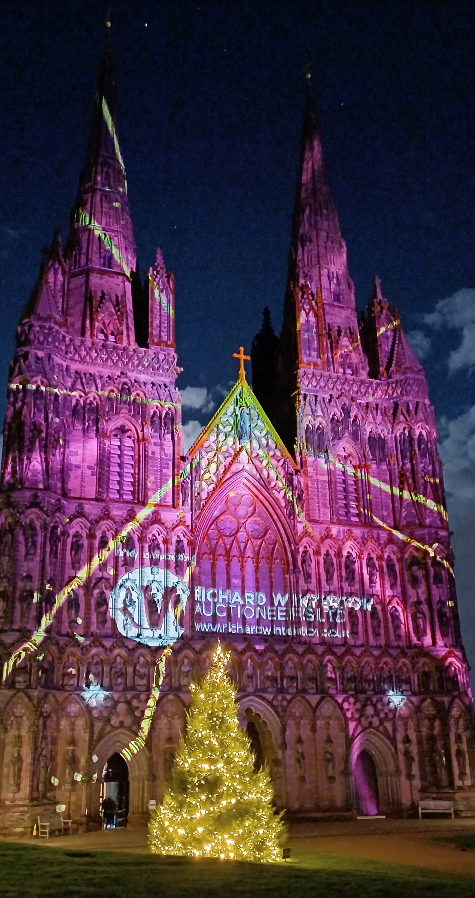 Lichfield Cathedral's Christmas Light Show 2024 - the West Front of the cathedral.