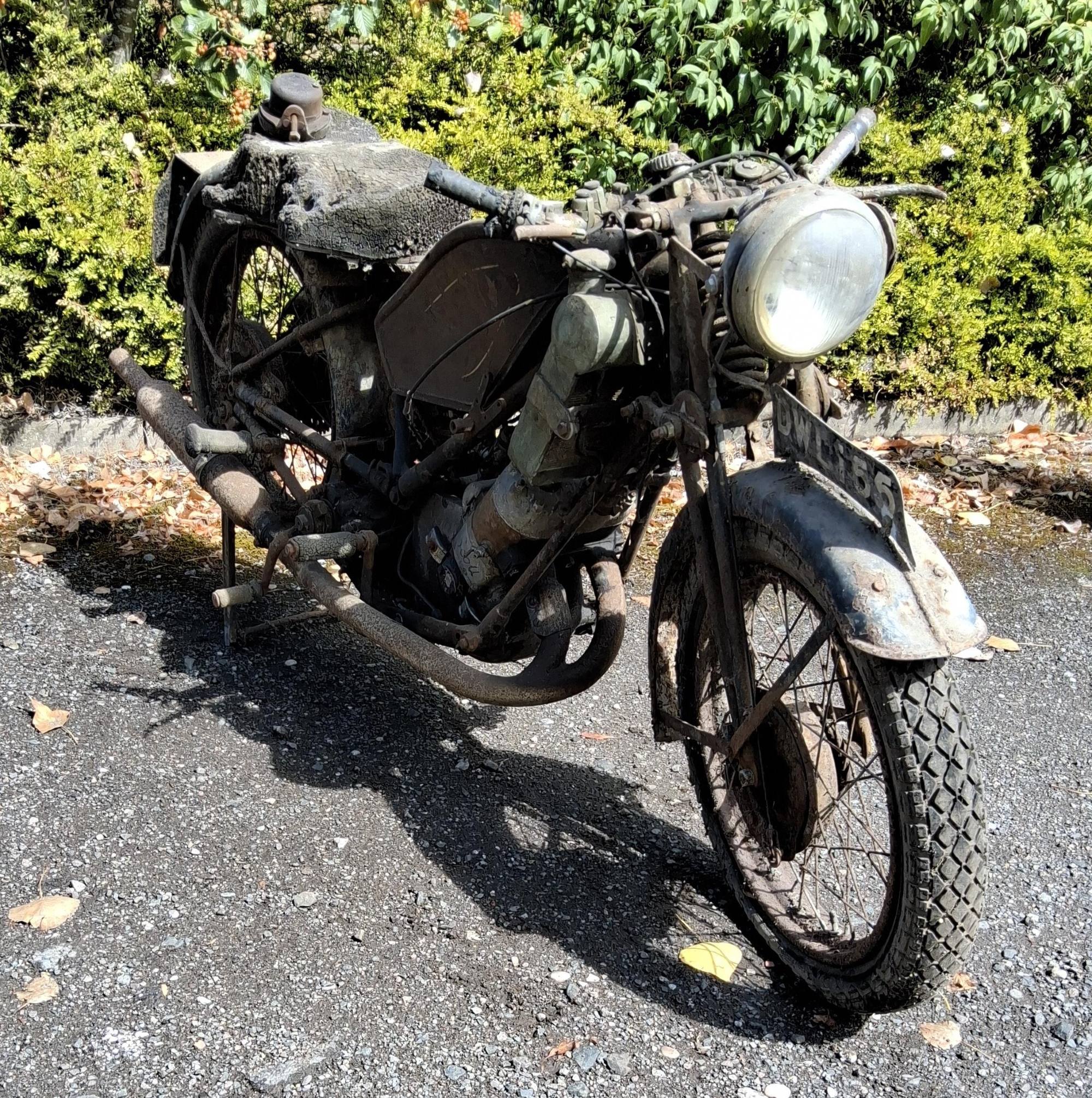 This 1940s Scott Flying Squirrel motorcycle is said to be ‘in true barn-find condition’.