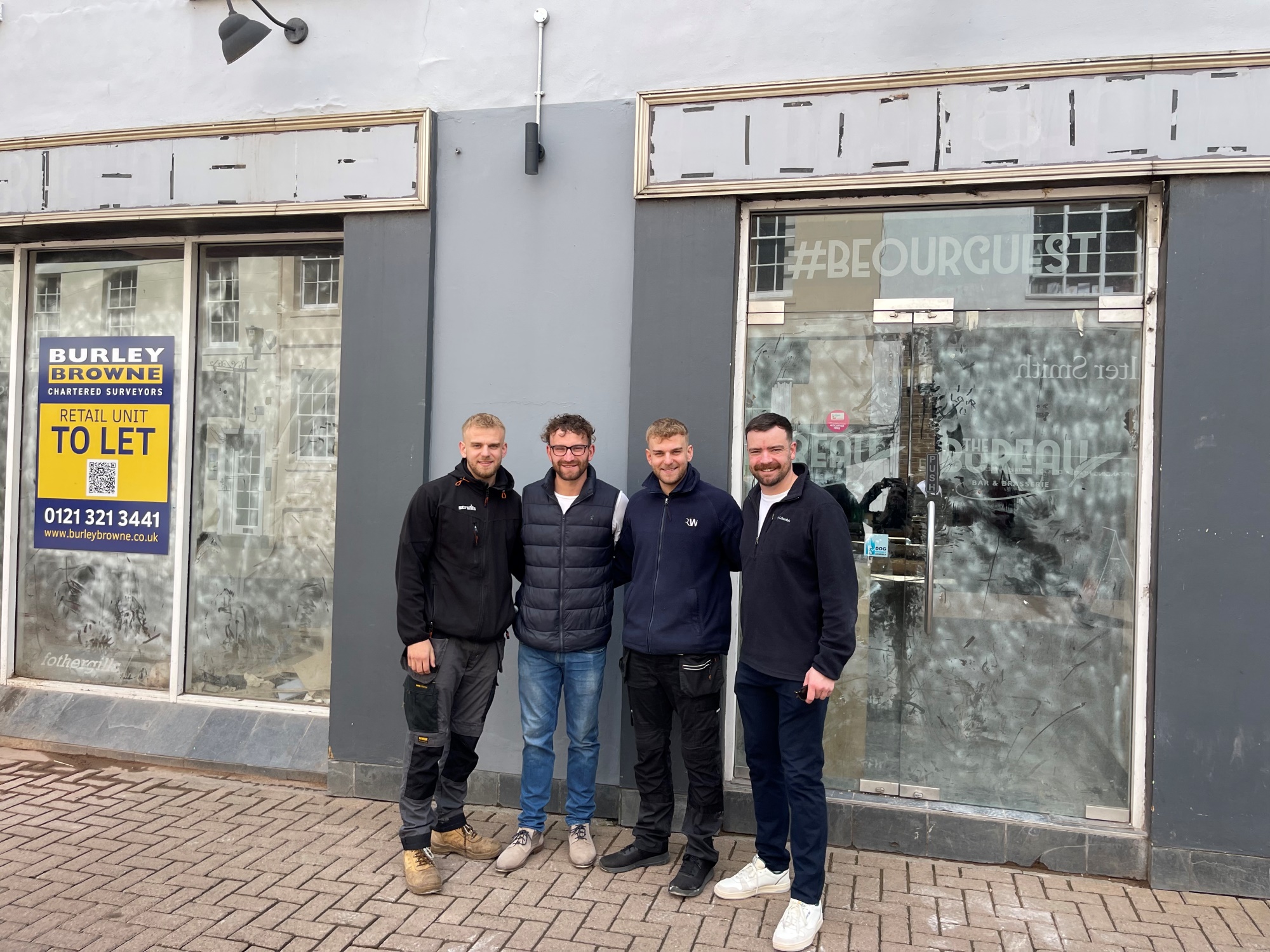 Harry, Tom, James and Ben Winterton outside the new location.