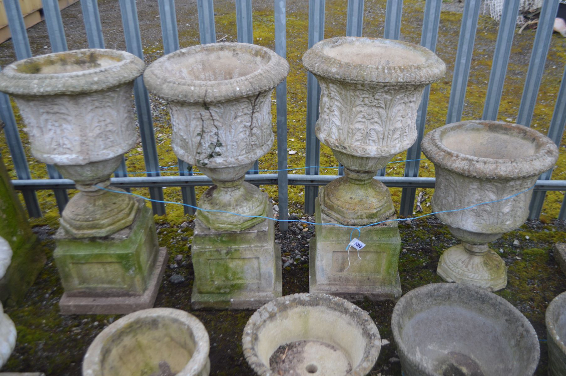 Set Of Four Composite Urns Sold £500