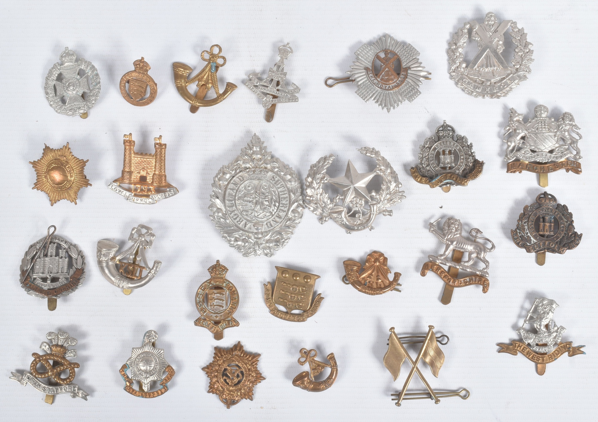 Selection From Collection Of Cap Badges Buttons And Shoulder Titles Sold £320