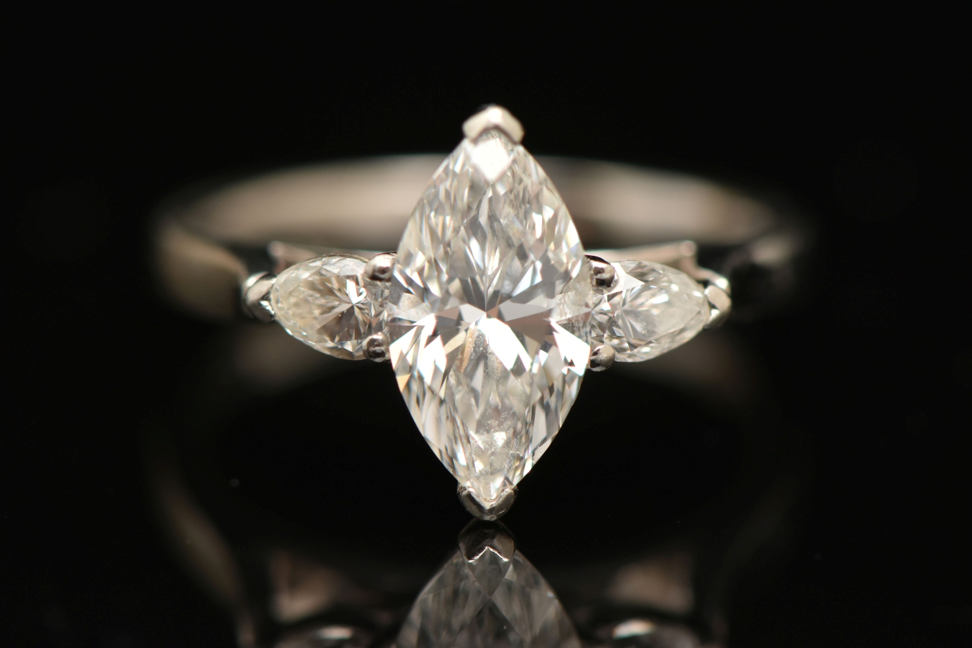 Marquise Cut Flanked By Pear Cut Three Stone Diamond Ring Sold £2,100