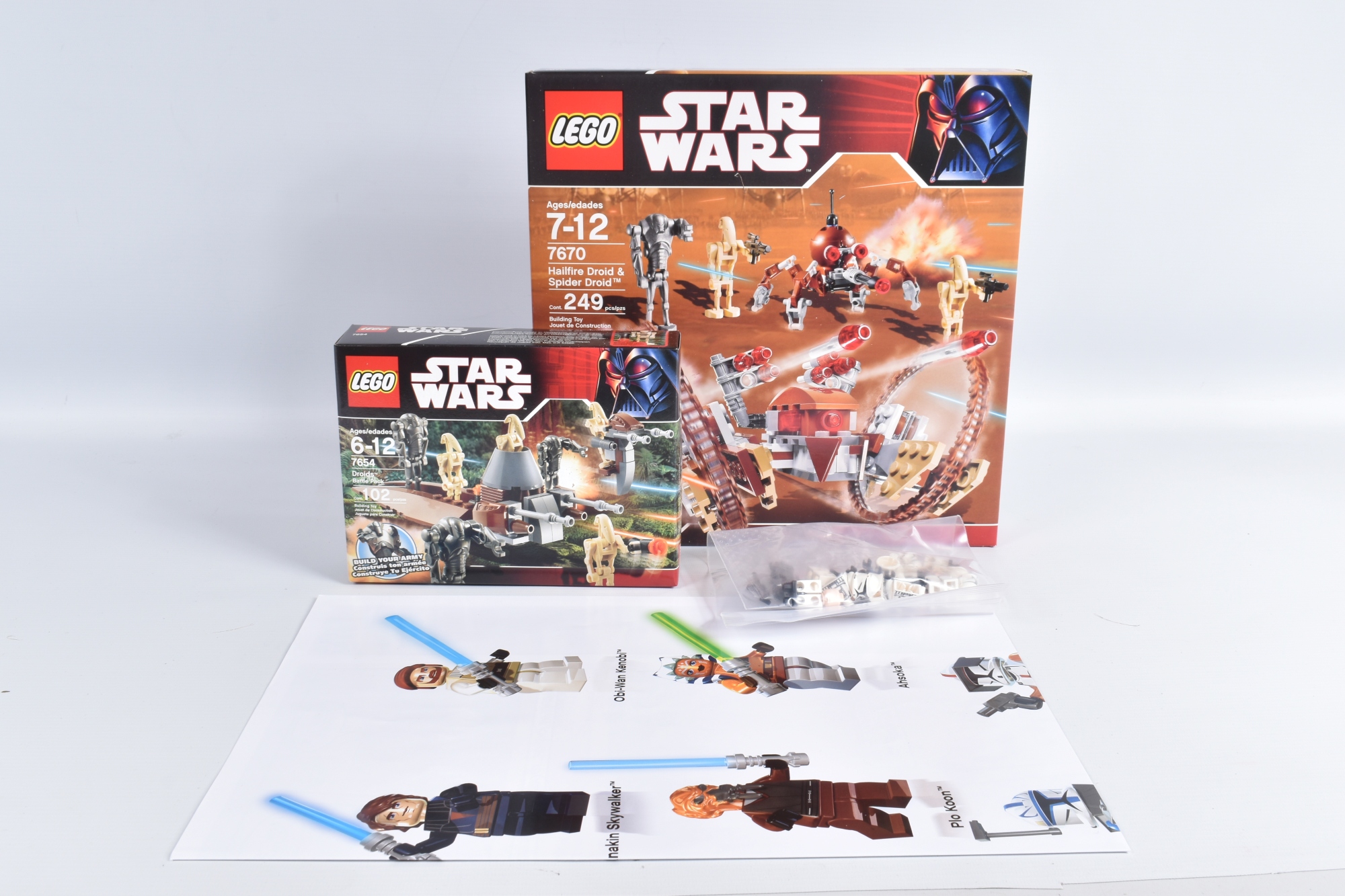 The package includes a boxed and sealed Hailfire Droid and Spider Droid set, Droids Battle Pack, Captain Rex and Clone Troopers figures and a double-sided poster.