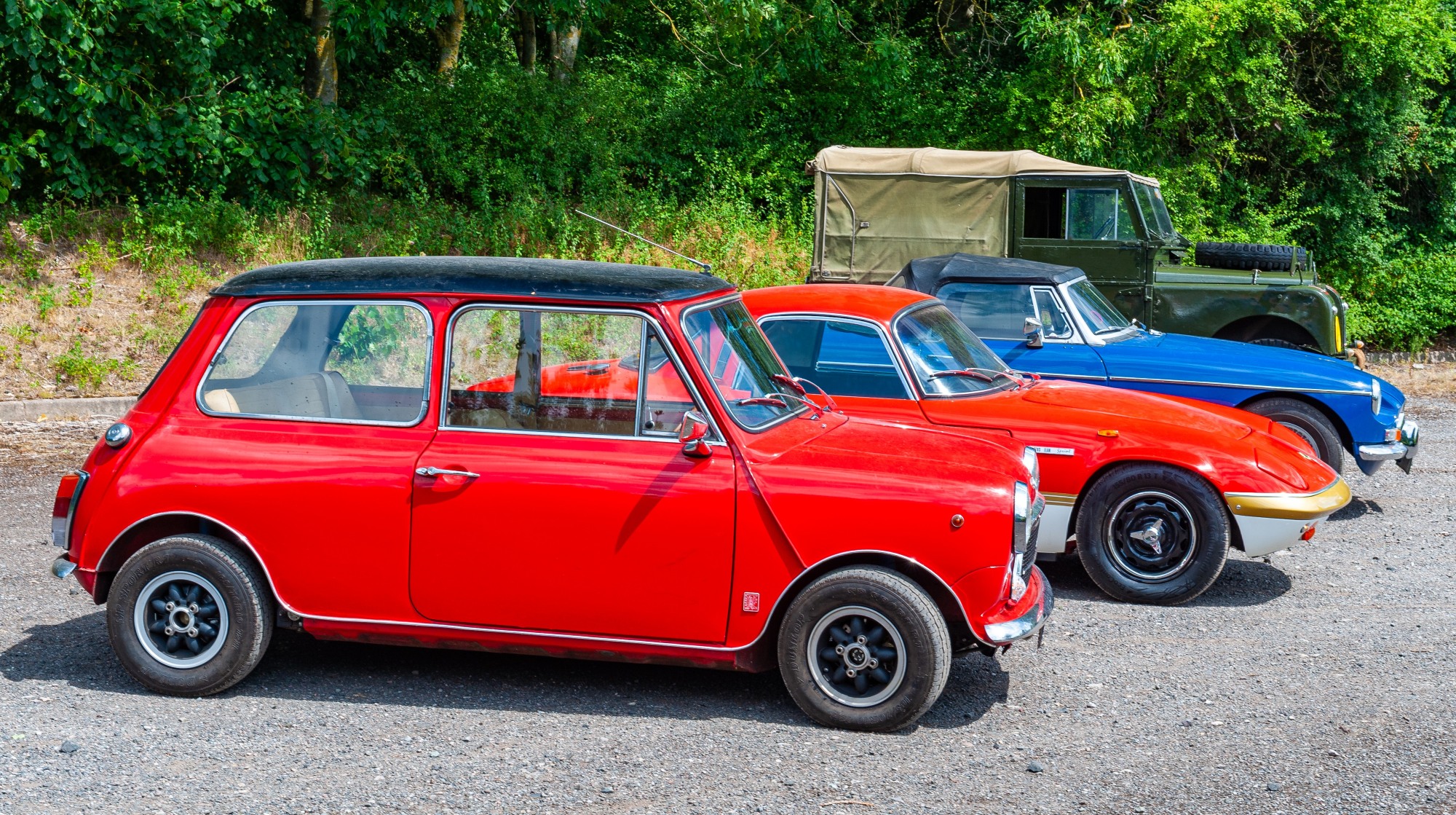 The Innocenti Mini Cooper, Lotus Elan Sprint FHC, MG B and Series One Land Rover.