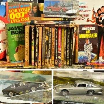 Lot 548 features a comprehensive collection of Pan paperbacks of Ian Fleming’s Bond books and Lot 513 is an almost complete set of the GE Fabri James Bond Car Collection models.