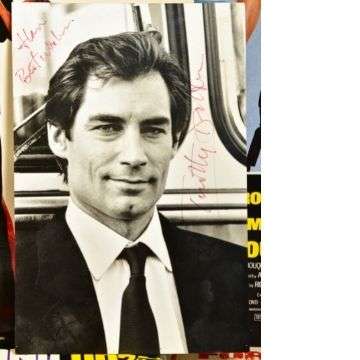 Lot 548 includes a signed photograph of Timothy Dalton, Roger Moore’s successor as James Bond.