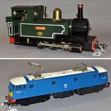 Lot 62, a 36cm-long live steam locomotive, is estimated to fetch between £300-£500. Below: Lot 53, a Tri-Ang OO gauge AL1 Class 81 electric locomotive.