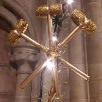 Richard Winterton Auctioneers' tree is topped by a star made up from golden gavels.