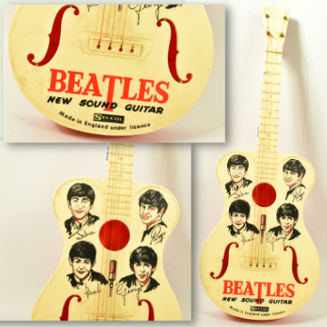 A 1960s Selcol Beatles 'New Sound' toy guitar.