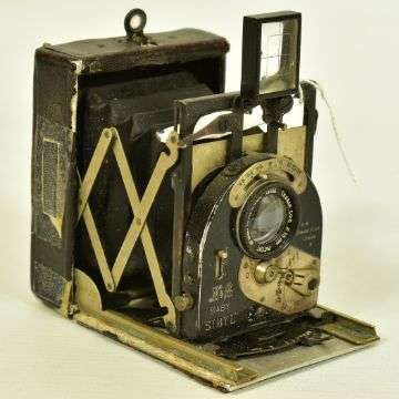 An ICA'BEBE strut folding camera.