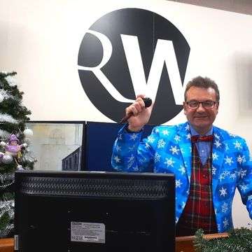 Dapper gent: Richard was suitably attired for the Bargain Hunt Christmas Special auction!