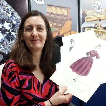 Senior valuer Sarah Williams inspects the Norman Hartnell dress designs for Princess Margaret.