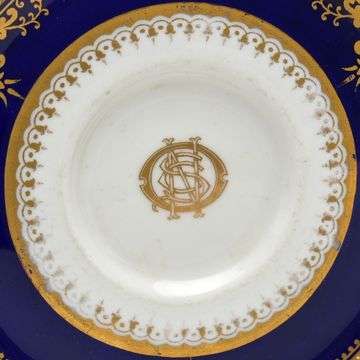 the well of the saucer bears a gilt monogram for the Oceanic Steam Navigation Company