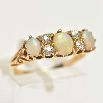 This early C20th 18ct gold opal and diamond ring sold for £220 on behalf of a Tamworth client.