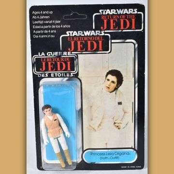 Lot 139: Princess Leia in Hoth Outfit. This 1983 Palitoy figure has the ‘tri logo’ on the packaging.