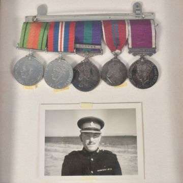 Lee’s eldest son Frederick’s framed medals are mounted on a wearing bar.