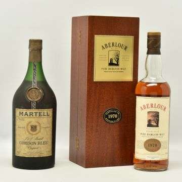 Martell Cordon Bleu Reserve Limitee (left) and a limited edition bottle of Aberlour Glenlivet Pure Highland Malt with wooden presentation case.