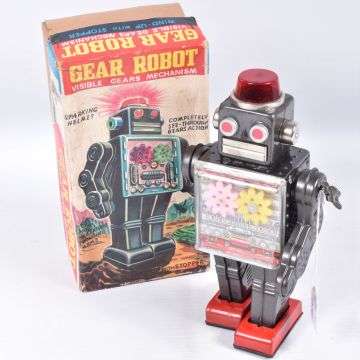 Lot 24: A Horikawa tinplate clockwork gear robot, made in Japan and complete with box.