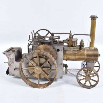 This live steam model traction engine sold at £520.