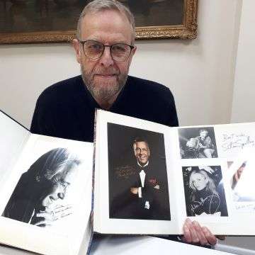 Robert French with two of the albums featuring Jack Lemmon (left) and Frank Sinatra.