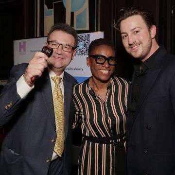 From left: Richard Winterton, auction host broadcaster Nikki Tapper and artist Charles Pedone.