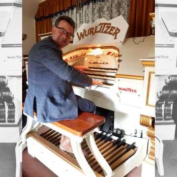 Auctioneer Richard Winterton with the Wurlitzer in Cannock.