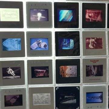 The auction includes around 5,000 photographic slides of space scenes.